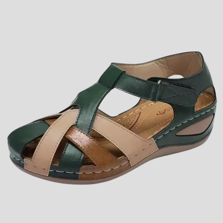 Stylish women's orthopedic arch support sandals with adjustable straps, available in burgundy and green.