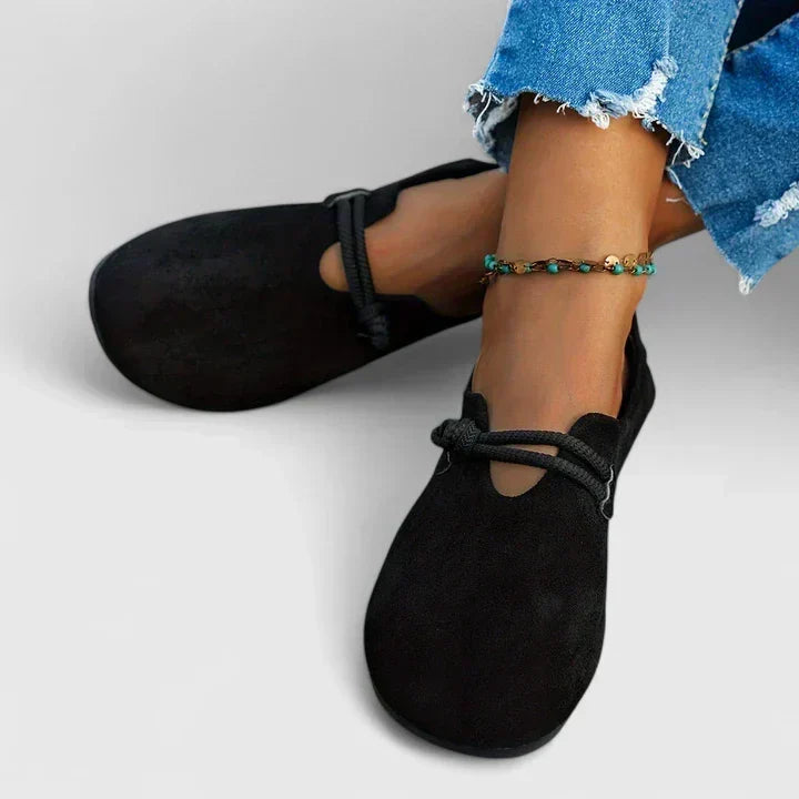 Boho style women's slip-on flats with a wide toe box & rope strap, ideal for casual and comfortable everyday wear.