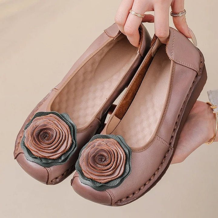 Close-up of women's floral appliqué slip-on loafer, highlighting the intricate design and comfort.