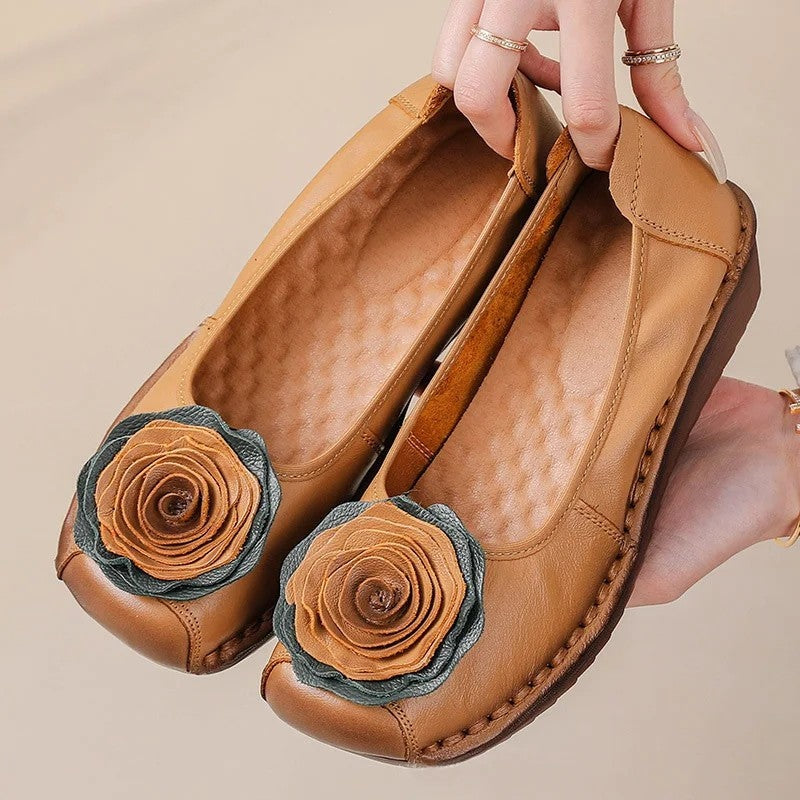 Women's everyday casual loafers with beautiful floral appliqué. Comfortable slip-on shoes for spring.