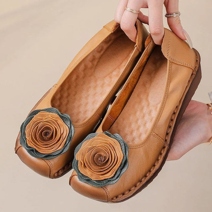 Women's everyday casual loafers with beautiful floral appliqué. Comfortable slip-on shoes for spring.