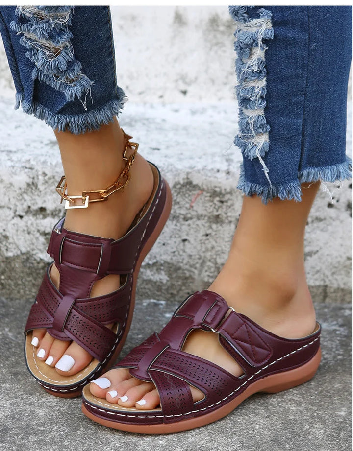 Close-up of cushioned footbed in women's orthopedic sandals, designed for foot health & pain relief.
