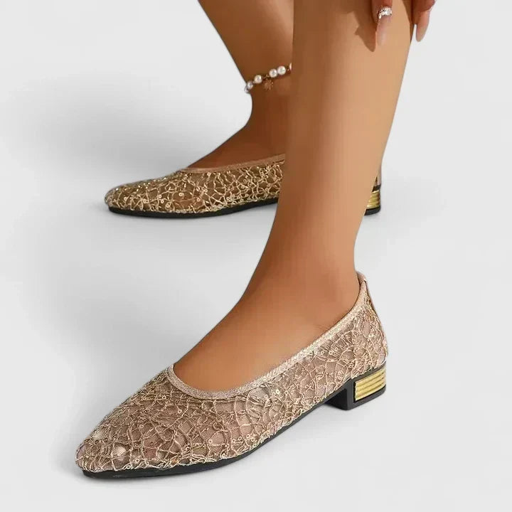 Stylish silver women's orthopedic shoes with non-slip sole, offering supportive comfort for everyday wear.