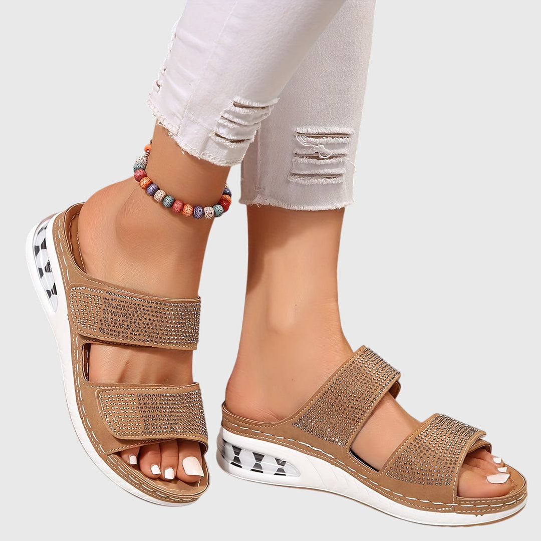 Slip-resistant women's comfort sandals with arch support, providing secure all-day walking relief.