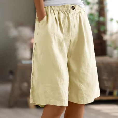 Mid-thigh women's summer shorts, relaxed fit & elastic waist, perfect for warm weather versatility.
