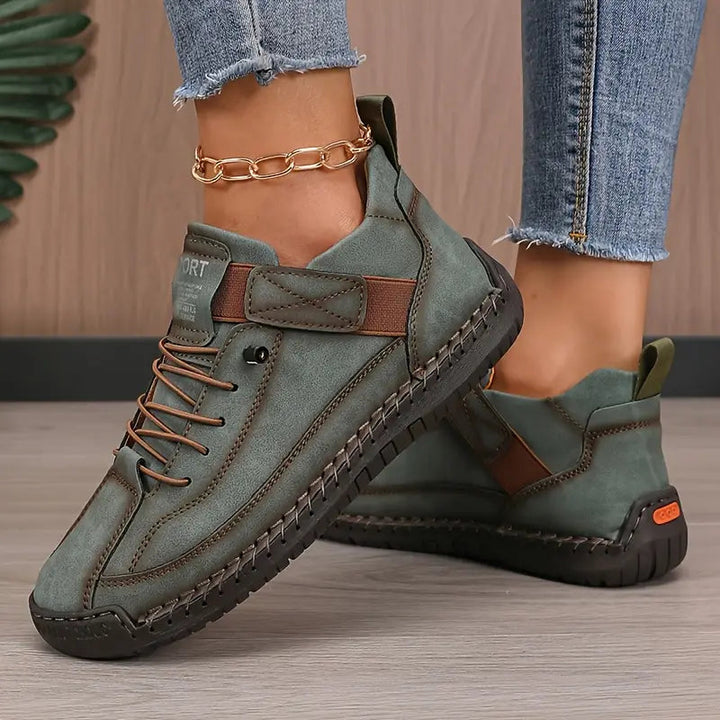 Side view of women's comfort slip-on walking shoes, showcasing lightweight design & cushioned sole.