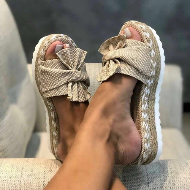 Women's comfortable arch support platform sandals for orthopedic relief.