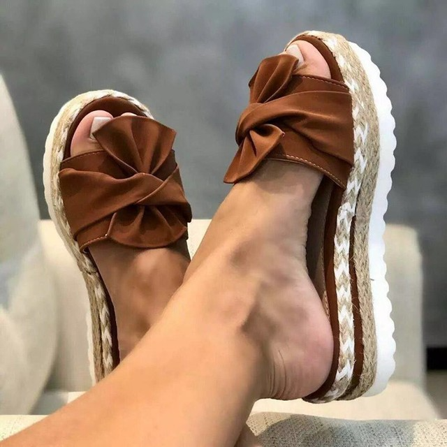 Open-toe platform sandals for women, offering arch support and summer comfort.