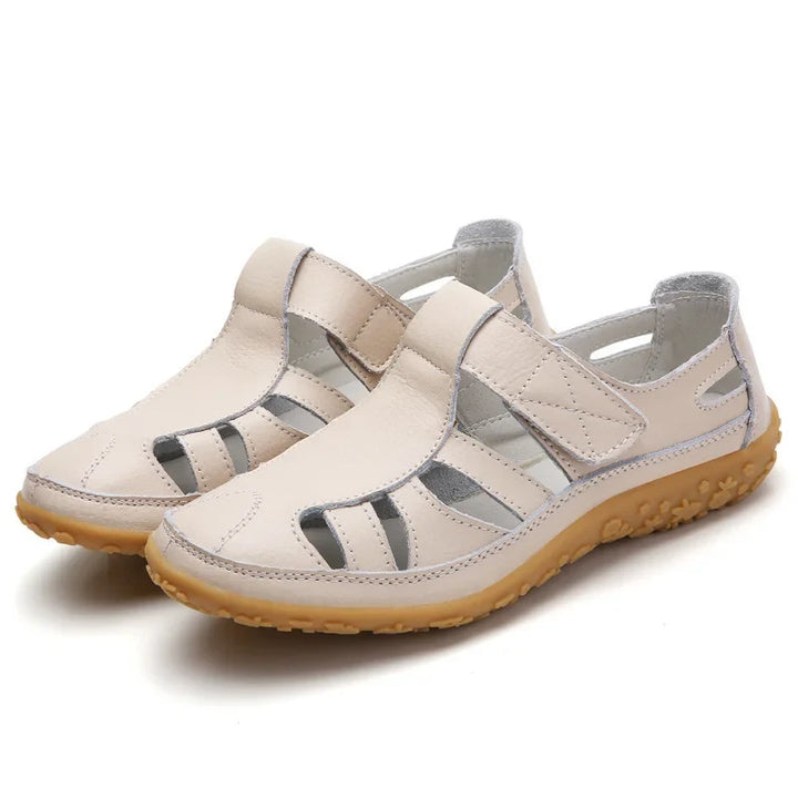 Slip-on open-toe sandals for women, offering balance and comfort.