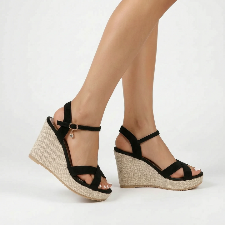 Black women's platform wedge sandals with a chic woven heel, offering comfort & style for summer events.