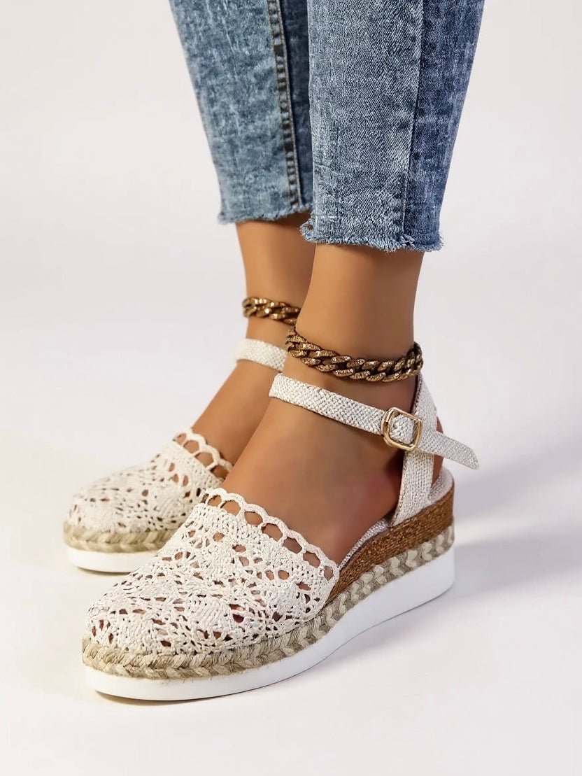 Bohemian women's espadrille platform sandals, comfortable beige summer shoes with a secure ankle strap.