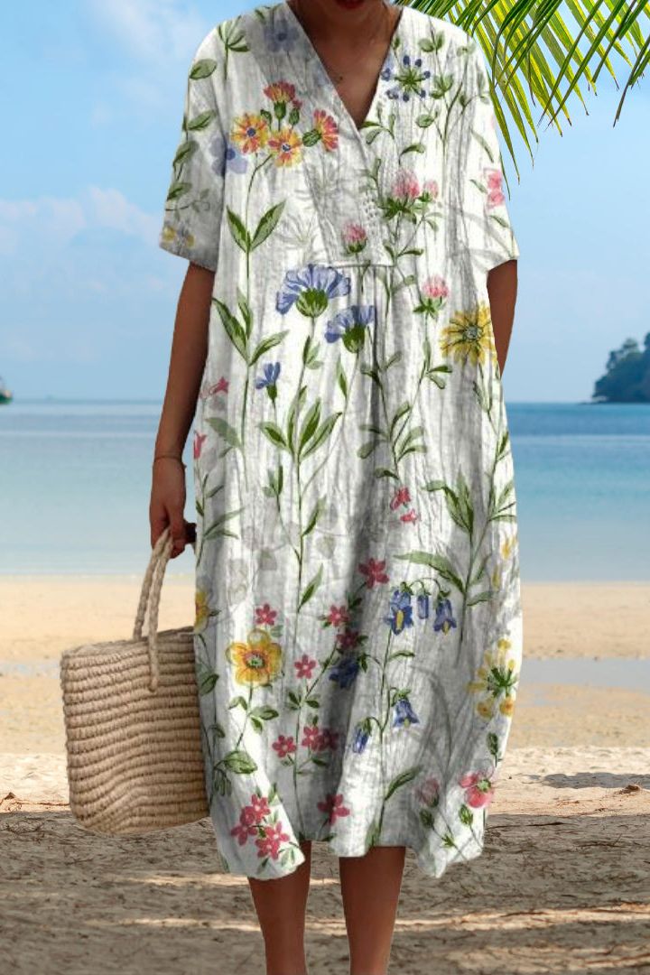 Elegant women's pink midi dress, classic design and comfortable for casual or work wear. Relaxed fit.