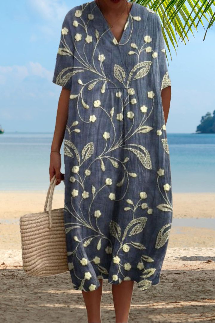 Beige classic midi dress for women, comfortable relaxed fit. Ideal for everyday elegance and versatile styling.
