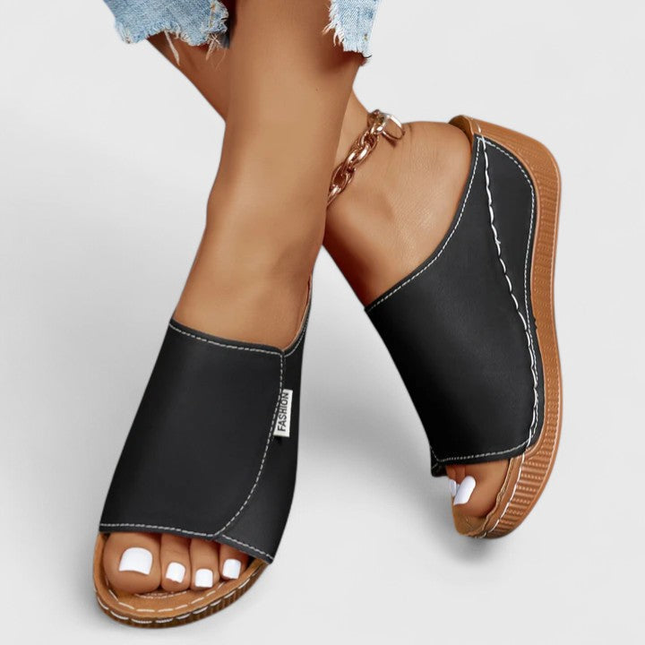Travel-friendly women's summer shoes, open-toe & comfortable for warm weather elegant casual wear.
