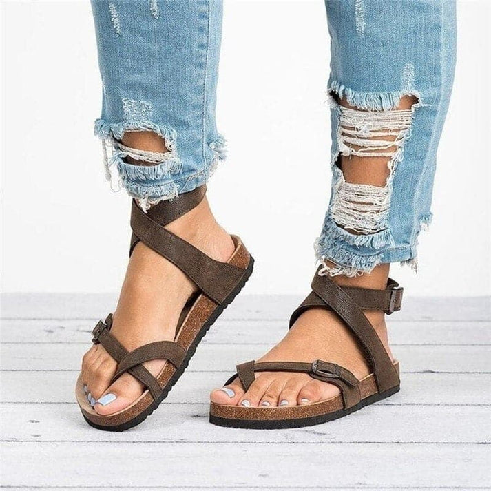 Women's comfortable flat strappy sandals with adjustable buckle. Ideal for summer casual wear & walking.