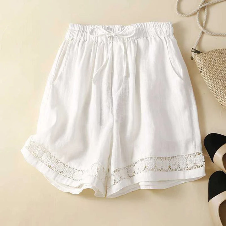 Women's comfortable floral shorts with elastic waist, perfect for summer casual wear & relaxed fit.