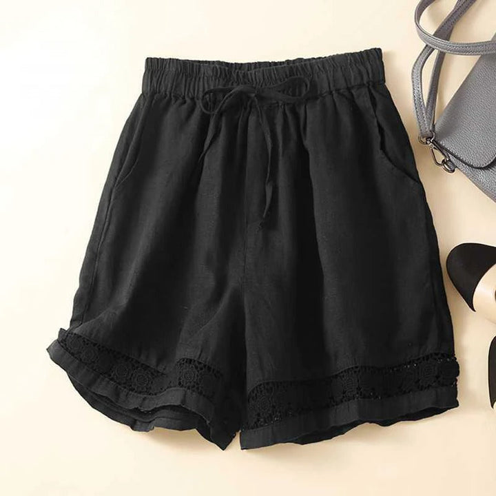 Stylish women's floral shorts featuring elastic waist, ideal for vacation wear, beach, or summer outings.