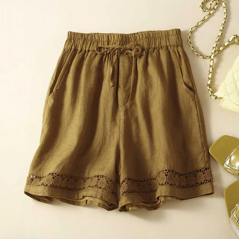 Relaxed fit women's floral pattern shorts with a comfortable elastic waistband for casual everyday style.