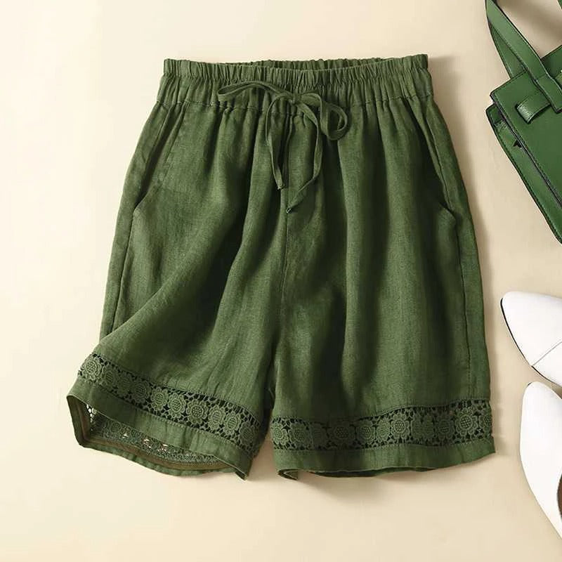Casual women's floral shorts, high comfort elastic waist, perfect for warm weather & relaxed activities.