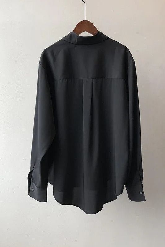 Lightweight, flowy women's blouse, offering comfortable and elegant style for any occasion. Everyday top.