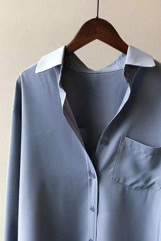 Versatile women's flowy top, easily transitions from a casual outfit to elegant office apparel. Comfortable.