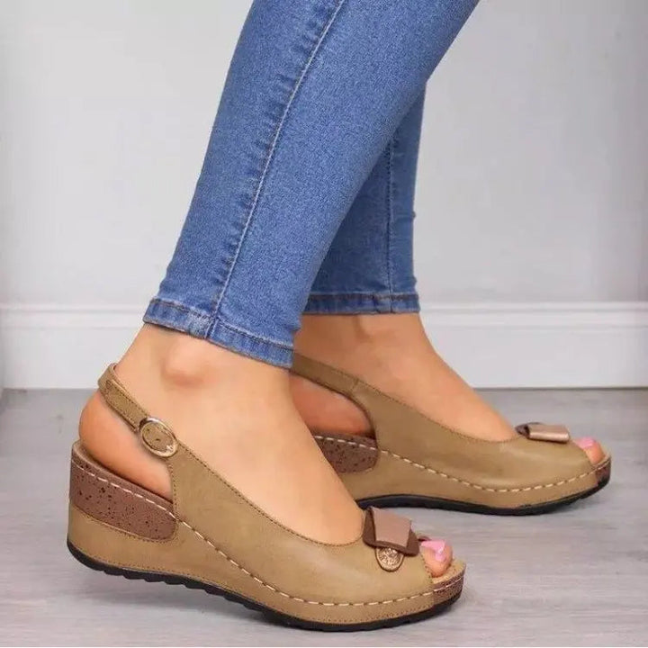 Stylish slip-on women's wedge sandals with peep toe & slingback, designed for summer casual comfort.