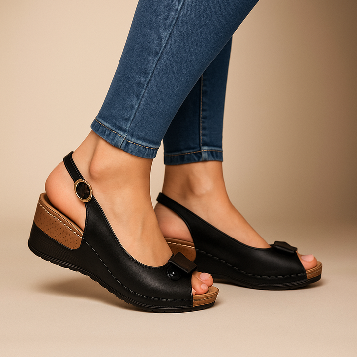 Elegant women's comfortable low wedge peep toe slingback sandals, great for any summer occasion.