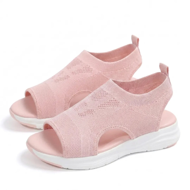 Women's orthopedic sandals with mesh upper, arch support for daily comfort.