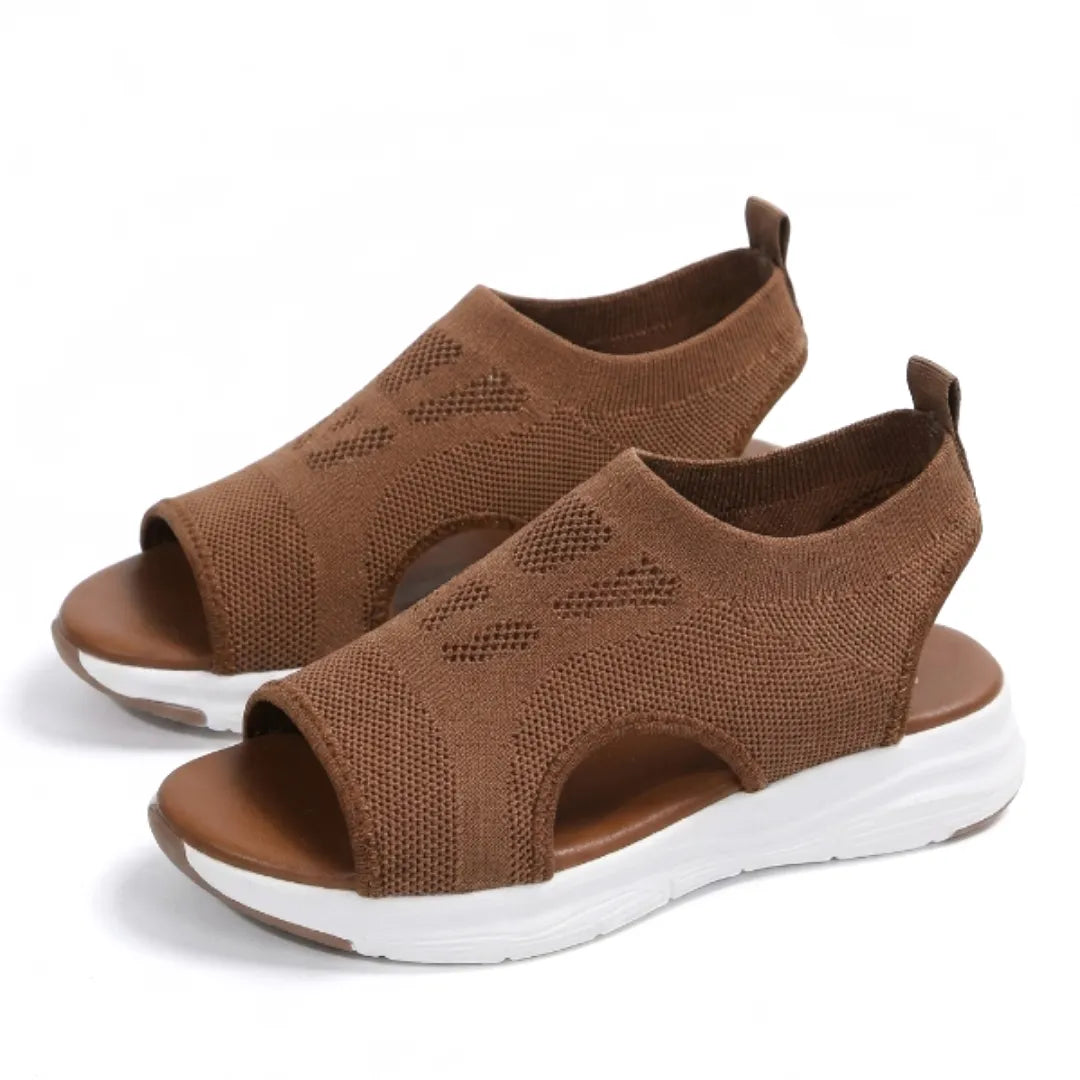 Casual women's summer sandals, mesh upper, comfortable arch support design.