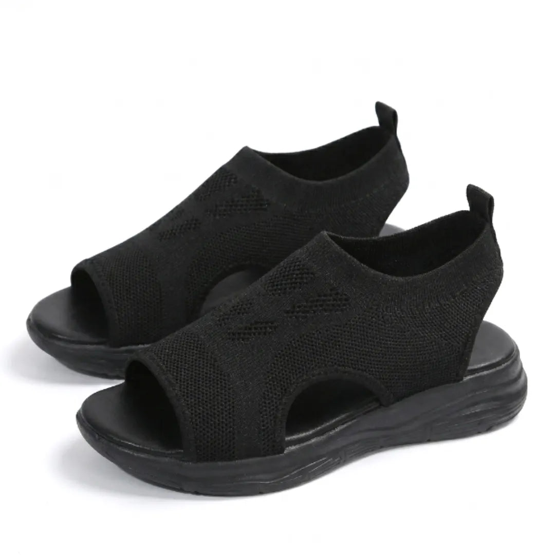 Comfortable women's orthopedic sandals, mesh upper, arch support design.