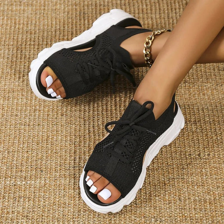Women's lace-up open toe platform sandals, offering comfort and support for daily wear.