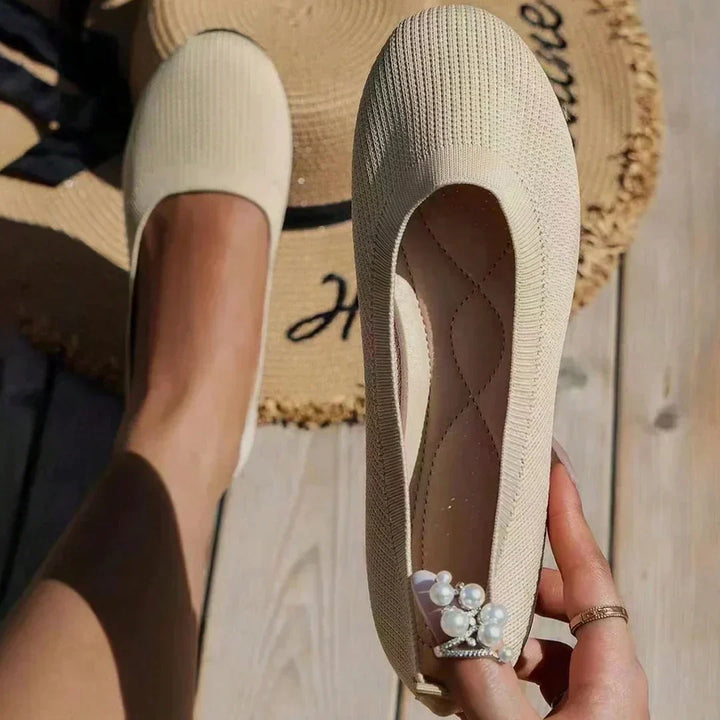 Women's slip-on flats with superior orthopedic support, comfortable for all-day walking.