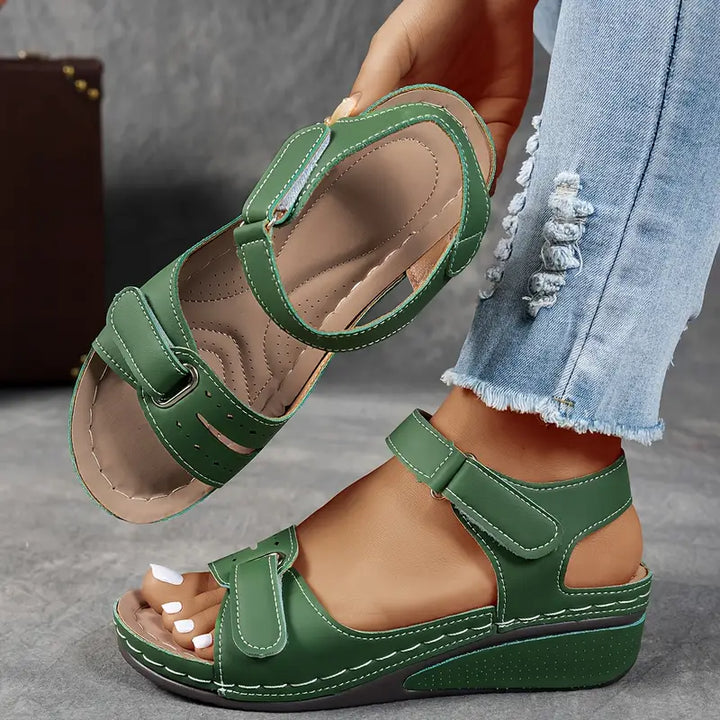 Adjustable women's platform sandals with secure Velcro straps. Comfortable summer footwear for everyday style.