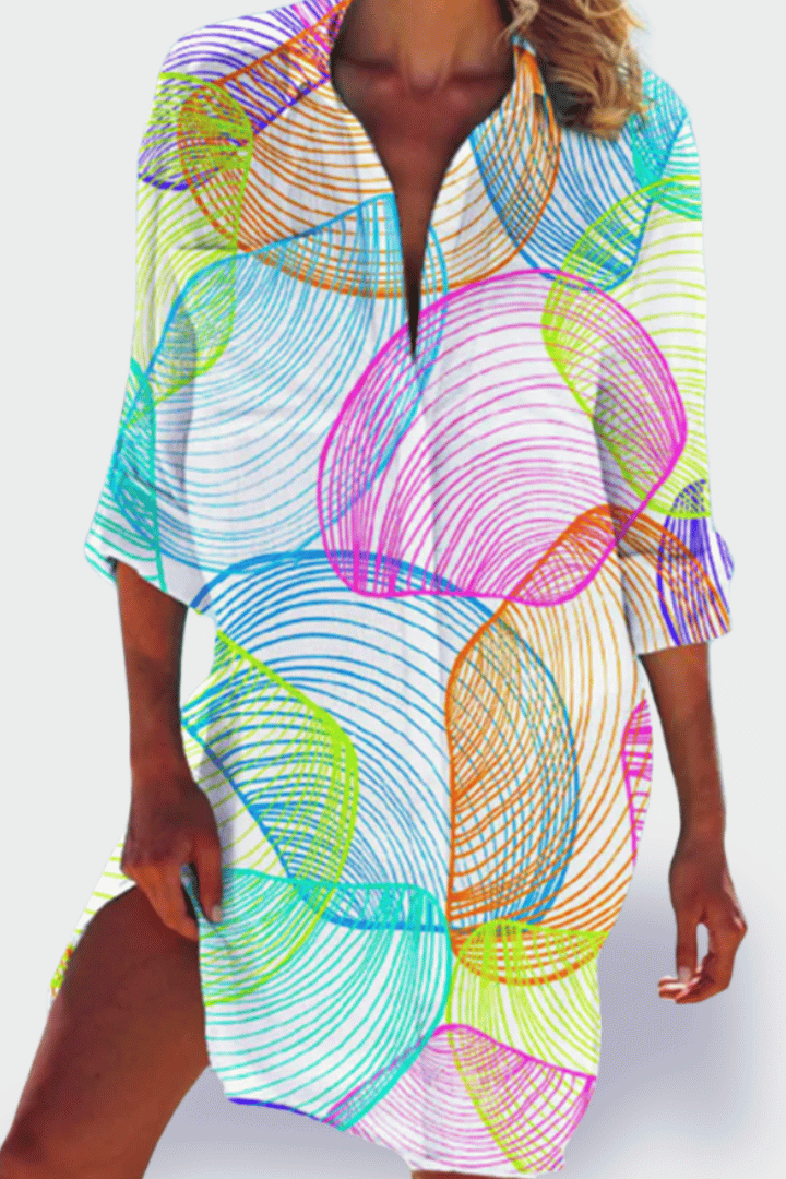 Patterned women's midi dress, relaxed fit & comfortable. Versatile for casual summer style or beachwear.