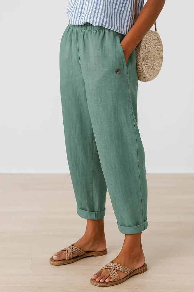 Women's versatile travel pants, relaxed fit with elastic waist, offering chic comfort all day.