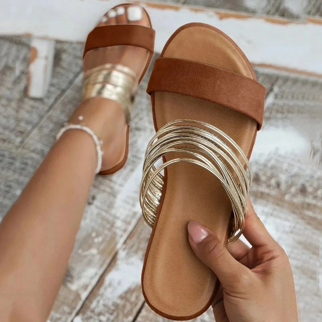 Effortless slip-on flat sandals for women, ideal for summer comfort & everyday wear.
