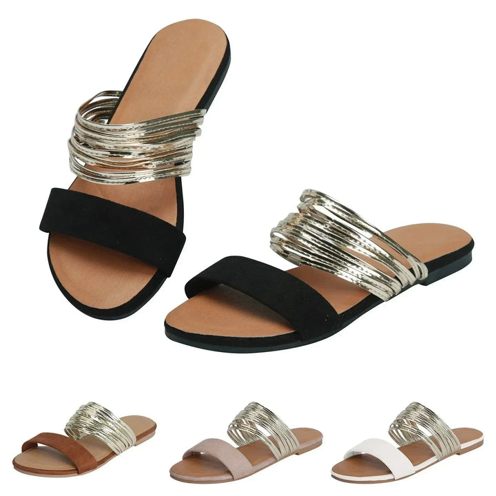 Women's flat slip-on sandals, designed for ultimate summer comfort.