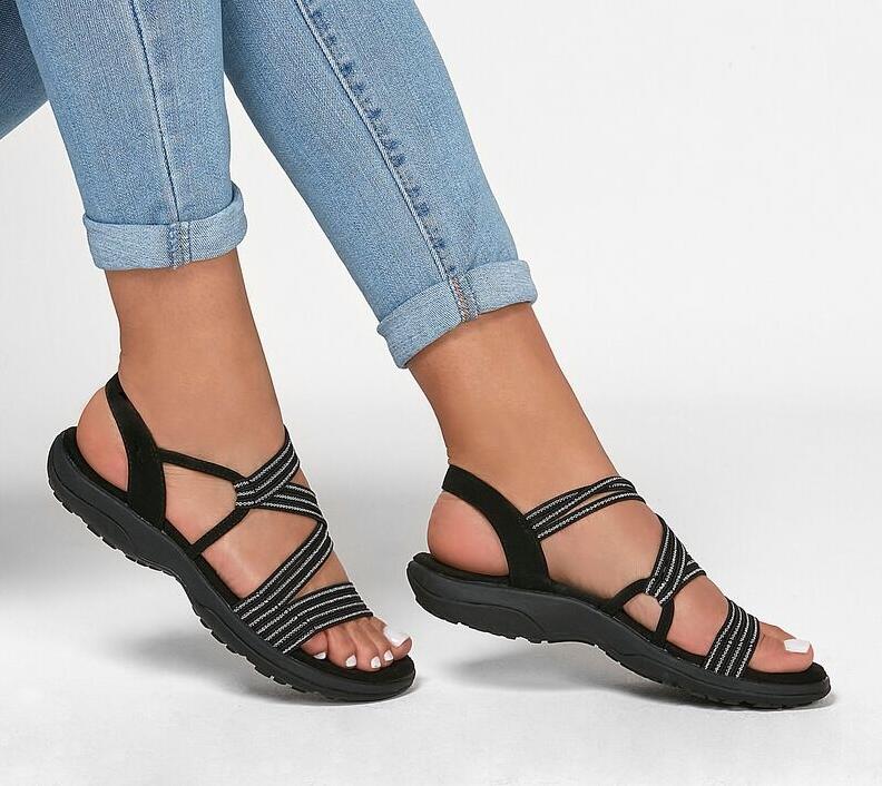 Women's comfortable slip-on sandals, perfect for casual summer wear. Lightweight & cushioned for everyday comfort.