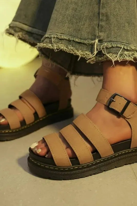 Comfortable women's slip-on sandals with arch support, ideal for casual summer style and daily walks.