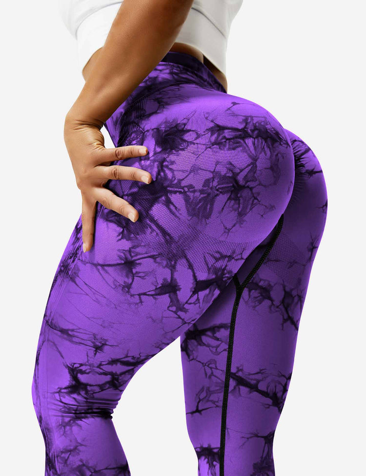 Close-up of vibrant tie dye pattern on women's yoga leggings.