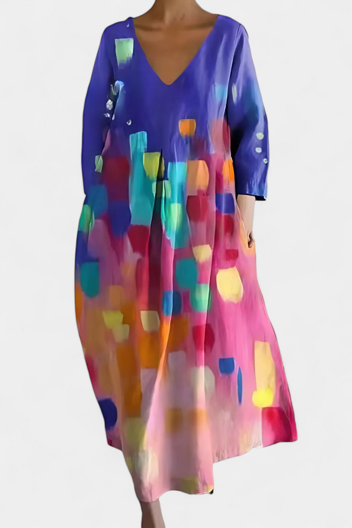 Comfortable women's flowy V-neck dress. Perfect elegant midi for summer casual outings.