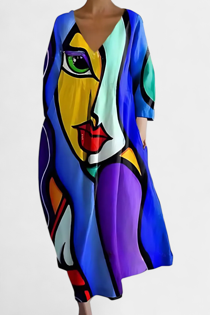 Women's summer V-neck flowy midi dress. Comfortable and elegant feminine fashion choice.