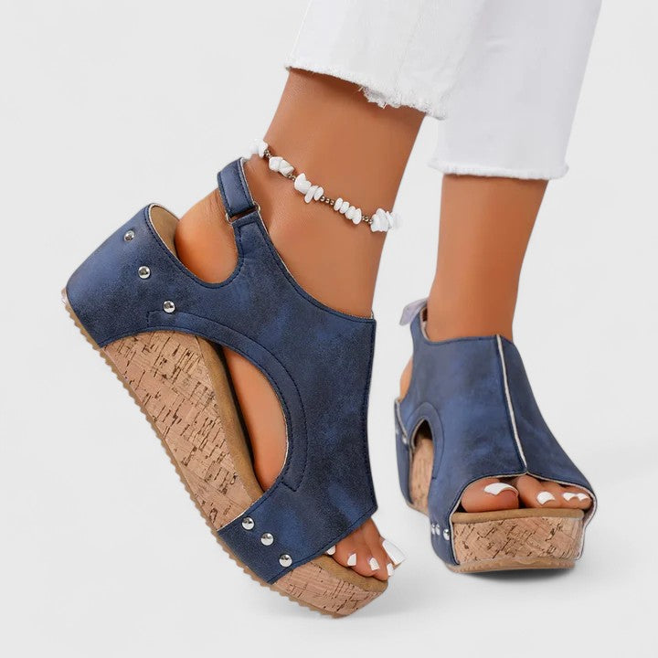 Women's comfortable wedge sandals with arch support for everyday wear. Stylish summer footwear.
