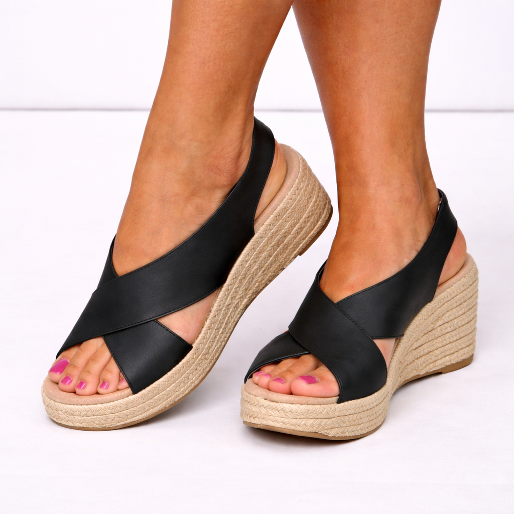 Women's comfortable wedge sandals with stylish crossover straps, perfect for summer casual wear.
