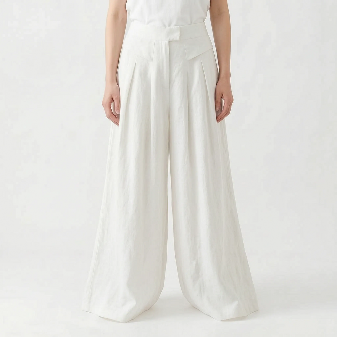 Pleated wide-leg women's pants with comfortable elastic waist, designed for stylish summer outfits.