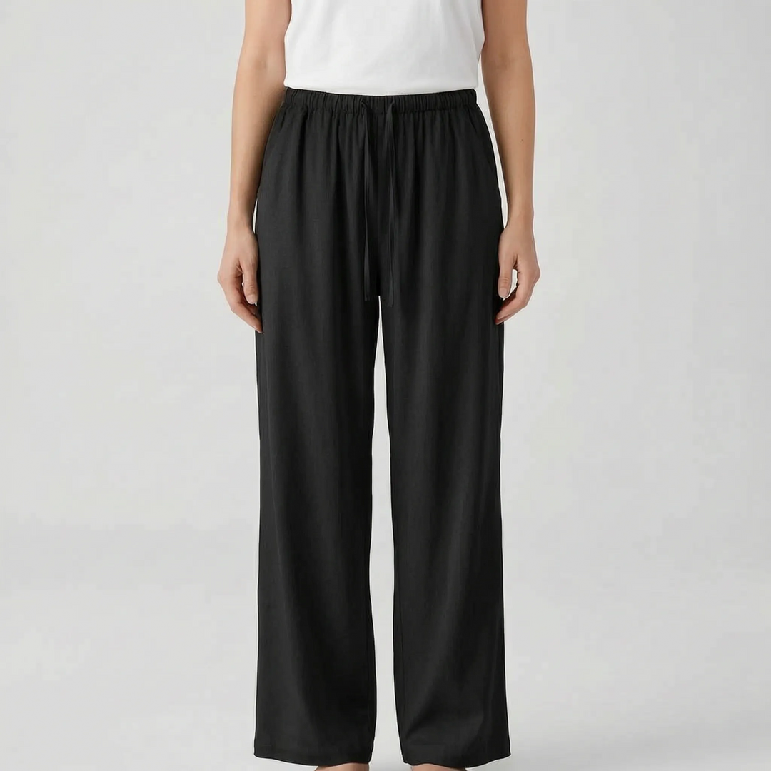 Breezy wide-leg summer pants for women, high-waisted & comfortable, perfect vacation wear.