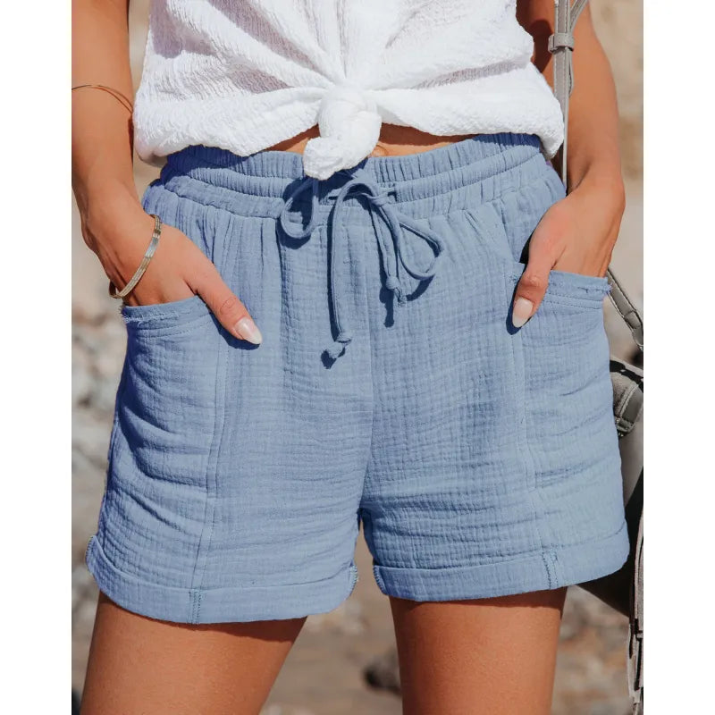 Stylish women's pull-on casual shorts with functional pockets & adjustable drawstring waist.