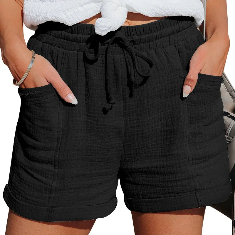Versatile women's summer shorts with comfortable drawstring waist and practical side pockets.