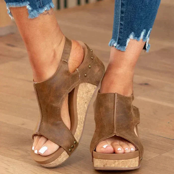Elegant women's summer wedge sandals, designed for orthopedic comfort with a cushioned and supportive sole.
