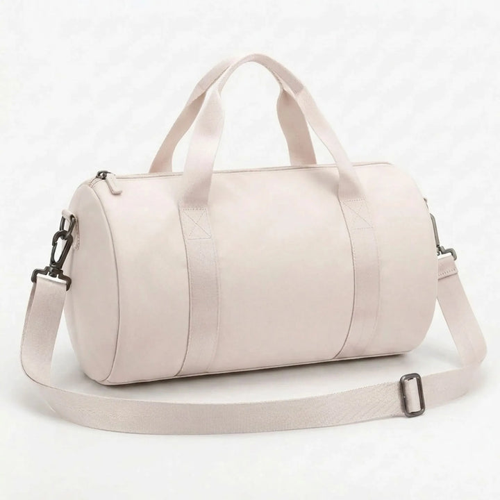 Women's mini gym duffel with comfortable shoulder strap, perfect for fitness, travel, and activewear.